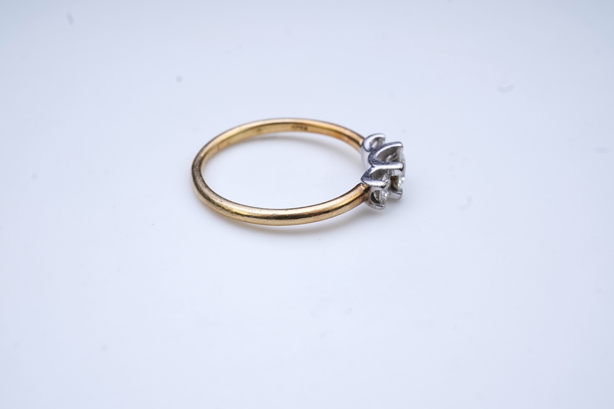 A three-stone diamond ring